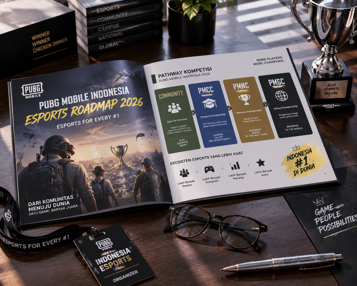 Dokumen cetak roadmap esports PUBG Mobile Indonesia 2026 dan piala kejuaraan di meja manajemen turnamen.